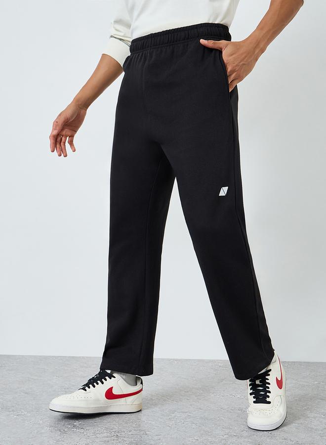 Styli Men Black Embroidered Fleece Joggers - Image 1